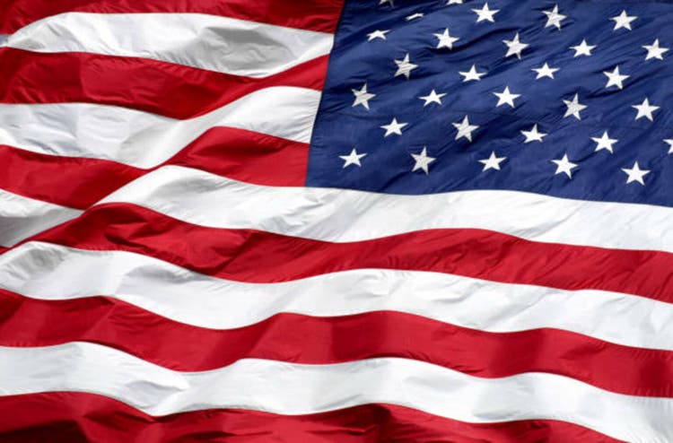 Close-up of the American Flag waving used for background