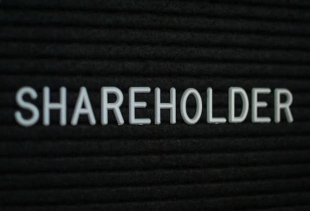 Word shareholder written on the letter board.