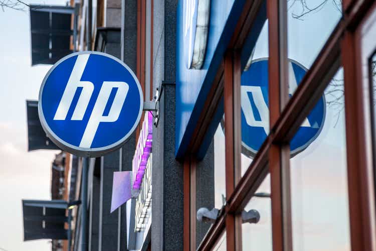 HP logo on their main shop for Hungary during the evening. Hewlett Packard is one of the main computer manufacturers in the world