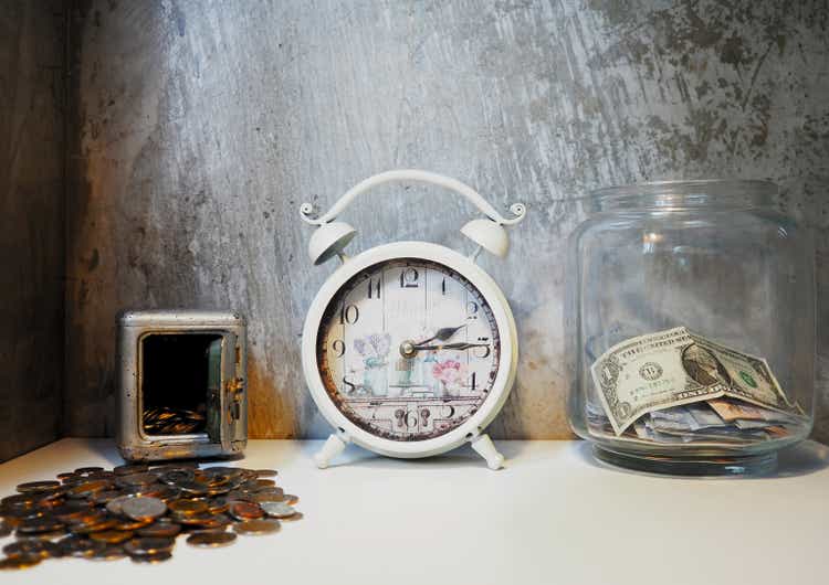 money growth and saving concept with timer clock