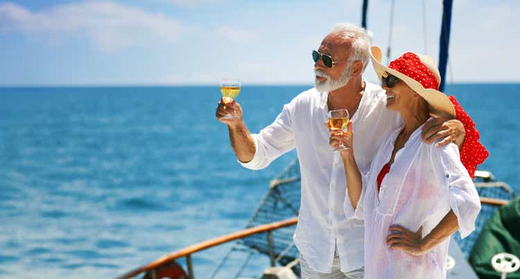 Senior couple on a sailing cruise.