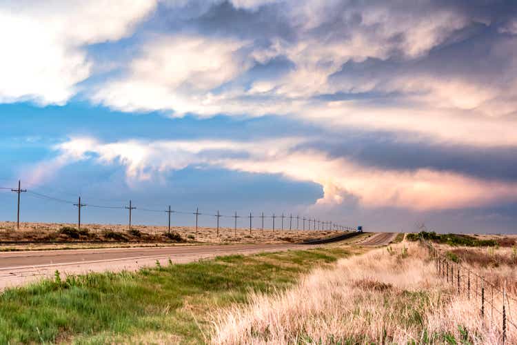 Remote road along Tornado Alley at Sunset