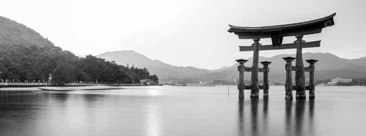 Magnificient Black and White Long Exposure Panorama Giant Torii Vermillion Floating Gate in Miyajima Hiroshima, Japan