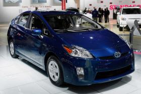 A third-generation Toyota Prius is shown at the North American International Auto Show in Detroit. U.S. car buyers bought a record number of hybrid and electric cars in March, as new models went on sale and gas prices neared $4 per gallon. Paul Sancya