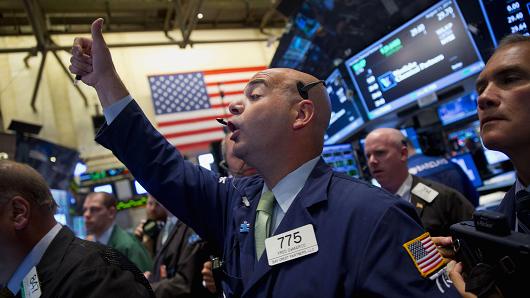 Traders work on the floor of the New York Stock Exchange (NYSE) in New York.