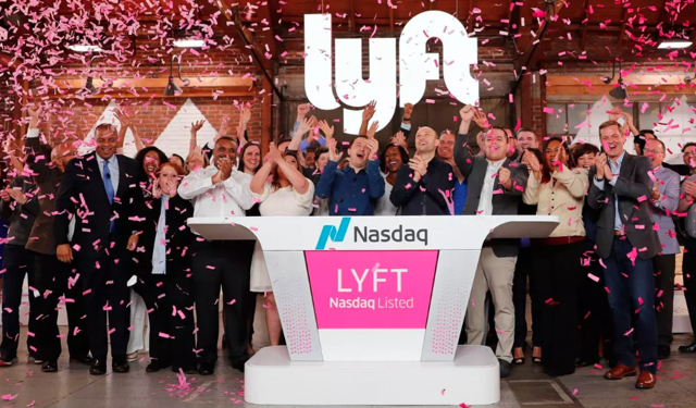 Lyft executives celebrate the IPO at the Nasdaq exchange