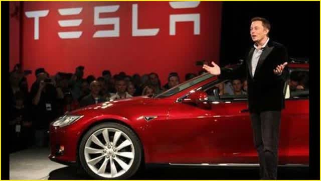 Elon Musk and a Tesla