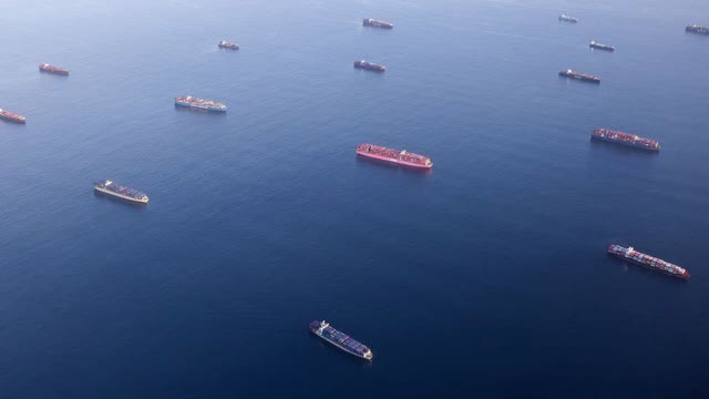 a large number of ships waiting on arrival to a California port
