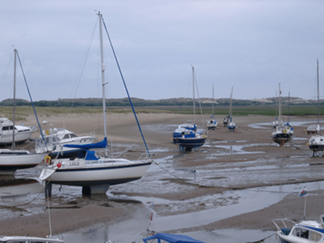 Sailboats in the mud