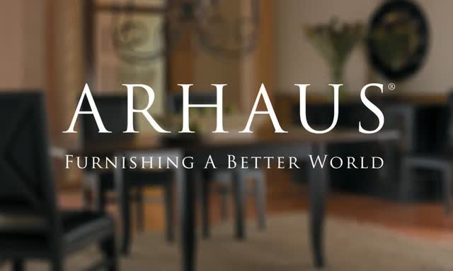 Arhaus logo with furniture in background