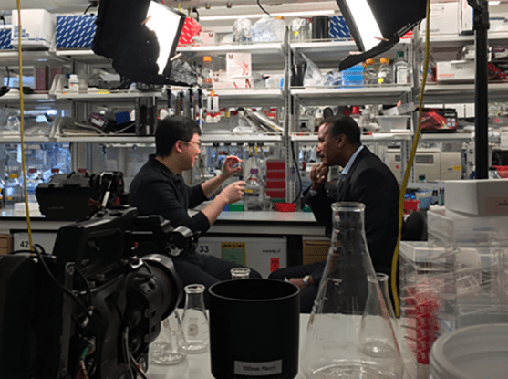 Feng Zhang and Bill Whitaker at the Broad Institute recording 60 Minutes