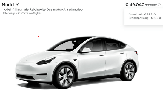 A white car with black text Description automatically generated