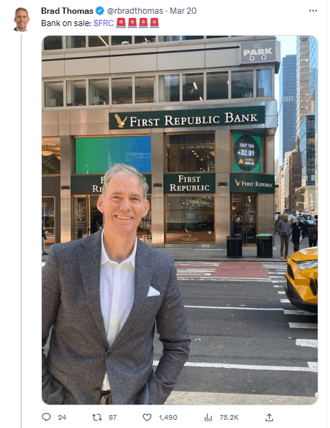 A person standing in front of a store Description automatically generated with low confidence