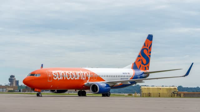 This image shows a Sun Country Airlines airplane.