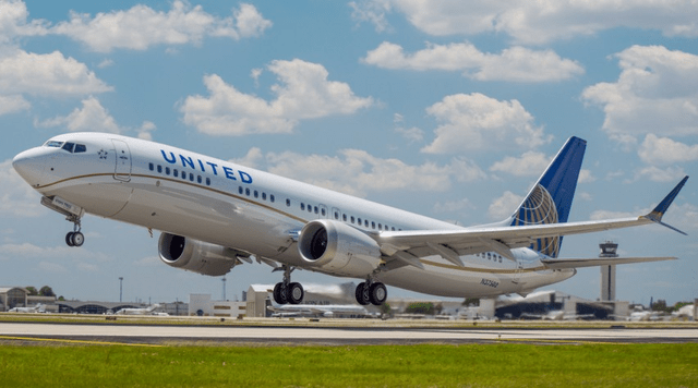 This image shows a Boeing 737 MAX United Airlines airplane taking off.