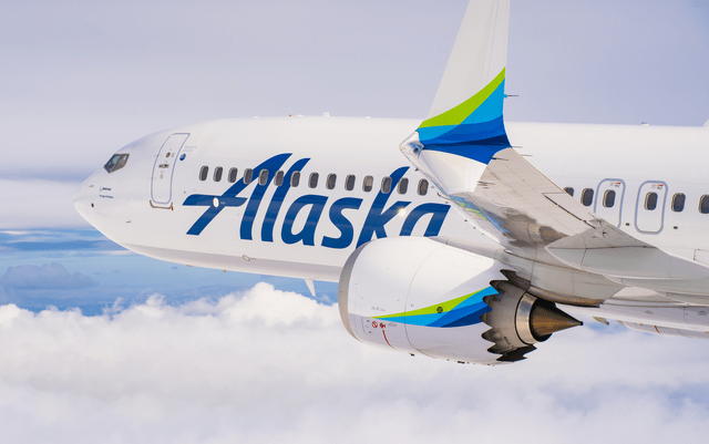 This image shows a close up of a Boeing 737 MAX airplane for Alaska Airlines.