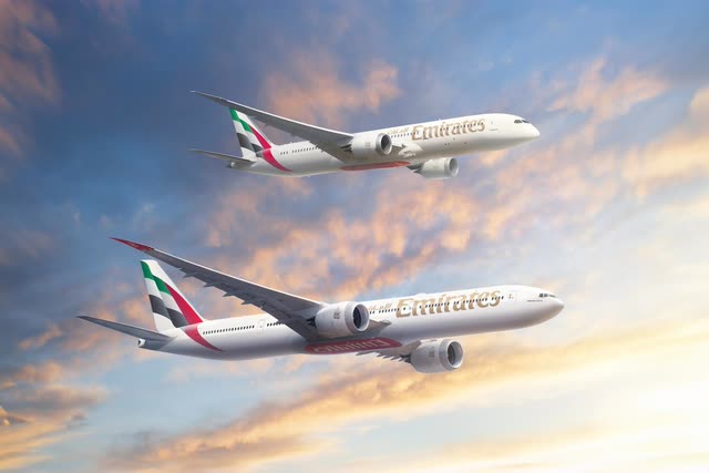 This image shows the Boeing 777X and Boeing 787 airplanes in the sky in Emirates colors.