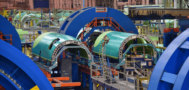 This image shows pieces of an airplane fuselage pieces manufacturer by Spirit AeroSystems.