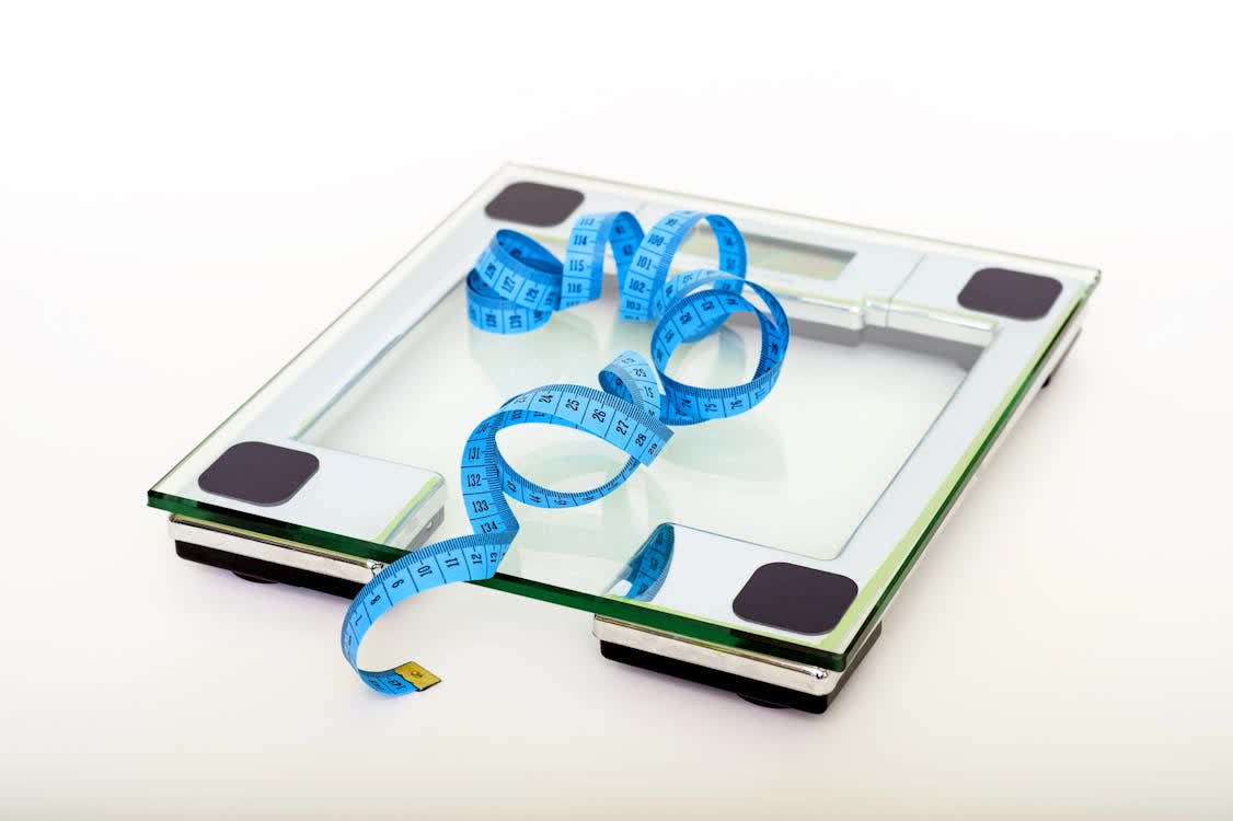 Free Blue Tape Measuring on Clear Glass Square Weighing Scale Stock Photo