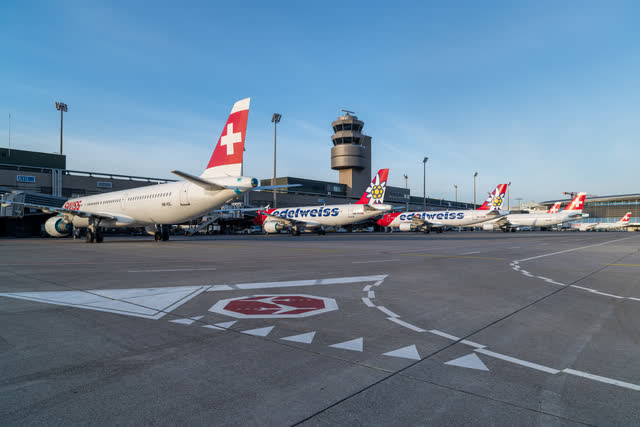 This image shows airplanes at the gate at for Zurich Airport.